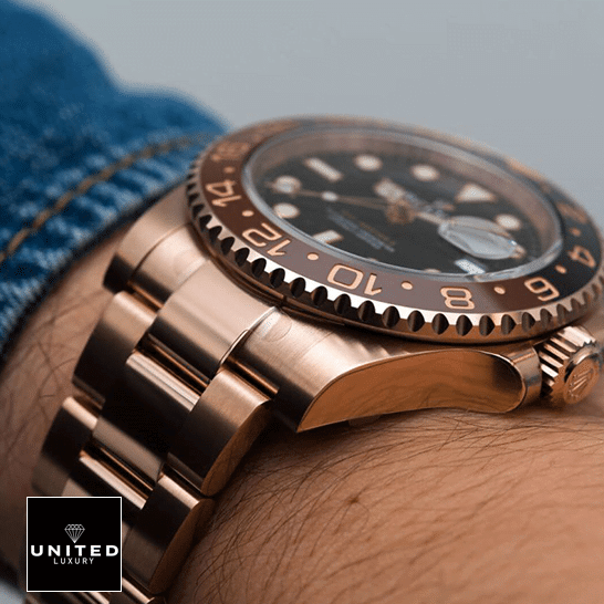 Rolex GMT-Master II 126715CHNR Perfect Clone 1:1 rolex gmt master 126715CHNR 0001 replica hand Rolex GMT-Master II 126715CHNR-0001 Stainless Steel Rose Gold Case Replica on his arm