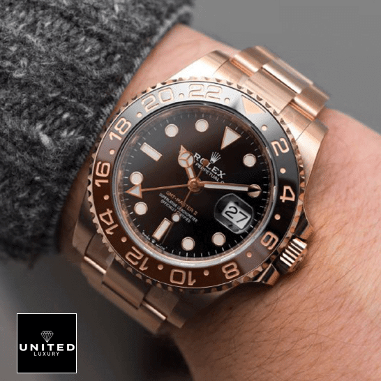 Rolex GMT-Master II 126715CHNR Perfect Clone 1:1 rolex gmt master 126715CHNR 0001 replica wrist Rolex GMT-Master II 126715CHNR-0001 Black Dial Replica on his arm
