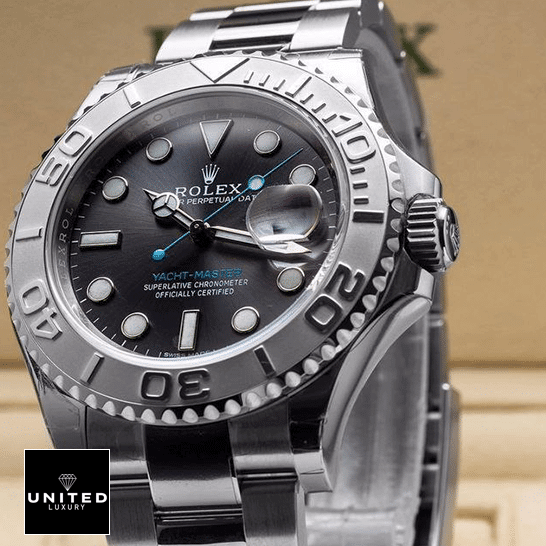 Rolex Yacht-Master 116622 Rhodium Supreme Replica Edition rolex yacht master 116622 0003 replica steel Rolex Yacht Master 116622-0003 Replica push button and brown background