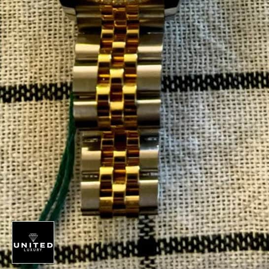 Rolex Lady-Datejust 279383RBR Champagne Diamond Master Clone Quality 5 5 Rolex Datejust 279383RBR-0003 Yellow Gold Jubilee Bracelet Replica on the table