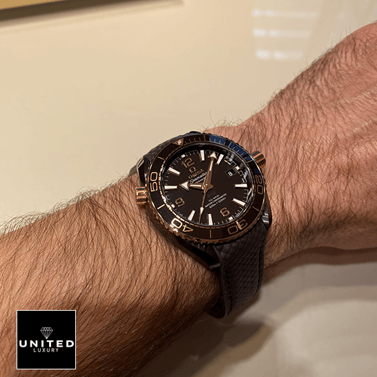 Omega Seamaster Diver Ceramic 215.62.40.20.13.001 Ultra Accurate Clone Omega Seamaster Brown Dial Leather Bracelet Replica on the man wrist