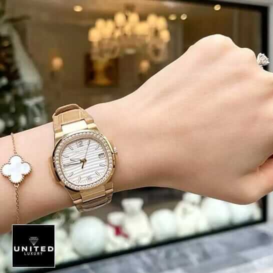 Patek Philippe Nautilus 7010R-011 "Silver Dial" High Fidelity Replica patek 7010r 011 replica 4 Patek Philippe Diamond Bezel Leather Bracelet Replica on the women wrist