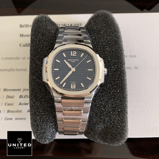 Patek Philippe Nautilus 7118/1A Ladies Perfect Duplicate 1:1 patekphilippe nautilus 71181A 001 replica alpha Patek Philippe Nautilus 71181A-001 Blue Dial Replica on the black stand