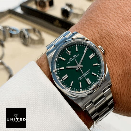Rolex Datejust 126000 Oyster Perpetual "Green Dial" Ultra Clone 1:1 Rolex Oyster Perpetual Green Dial 126000 Replica on his arm