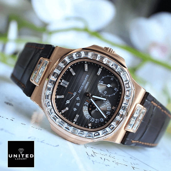 Patek Philippe Nautilus 5724 "Baguette Diamonds" 1:1 Clone Edition patek philippe baguette replica 1 Patek Philippe Baguette Diamond Bezel Black Dial Replica side view